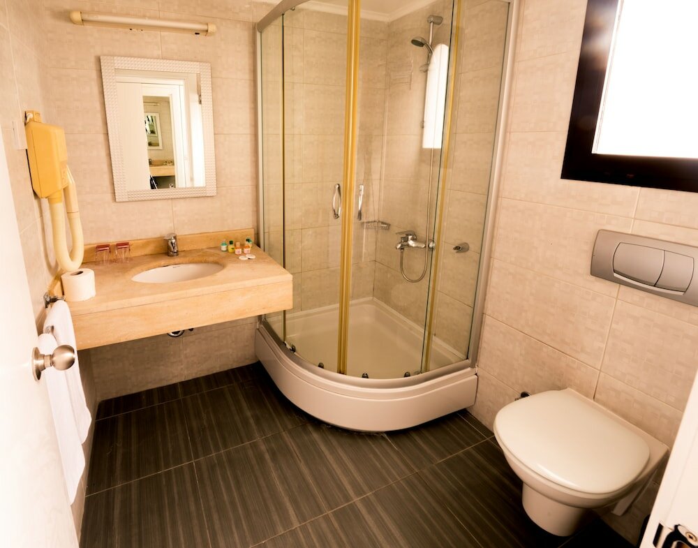 Фото The Olive Tree Hotel