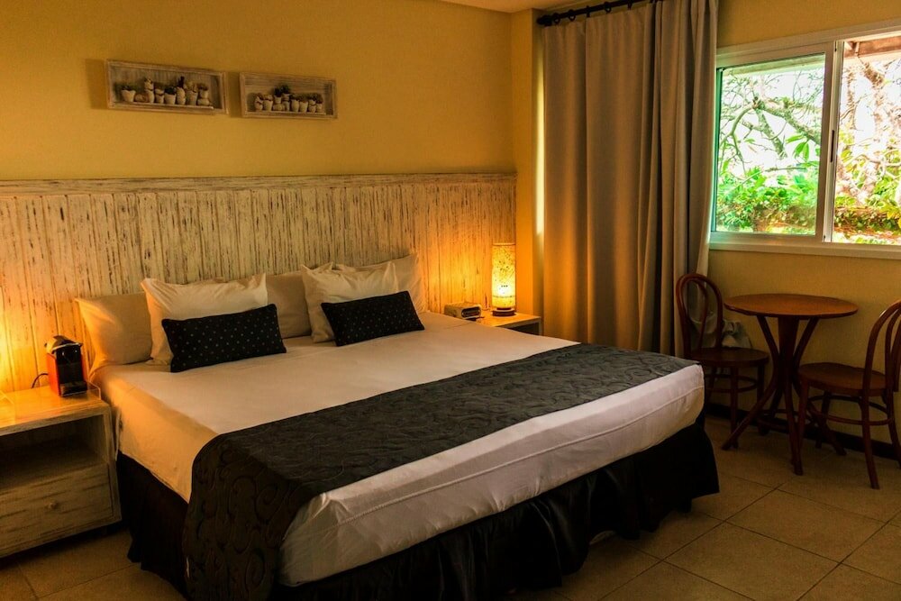 Фото Farol de Itapuã Praia Hotel