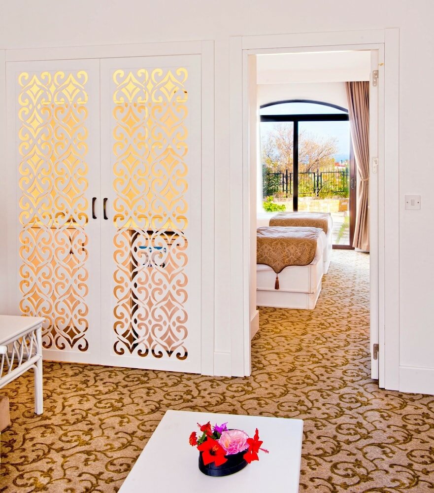 Фото The Olive Tree Hotel