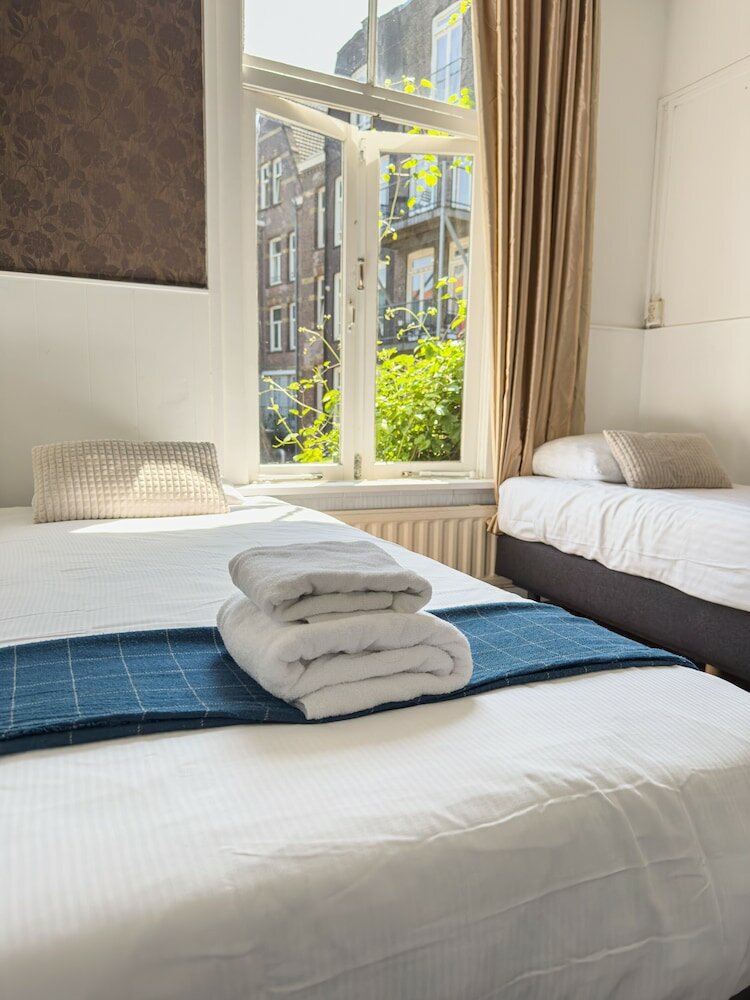 Фото Amsterdam Inn Hotel