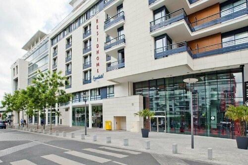 Гостиница Residhome Appart Hotel Monceau в Курбевуа