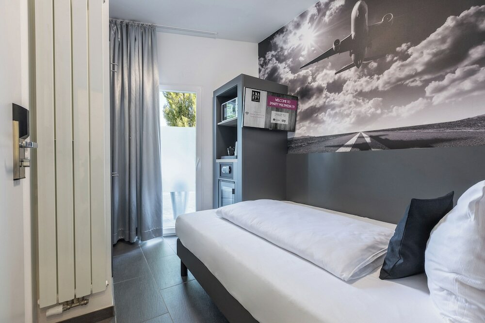 Фото Airport Hotel Dürscheidt