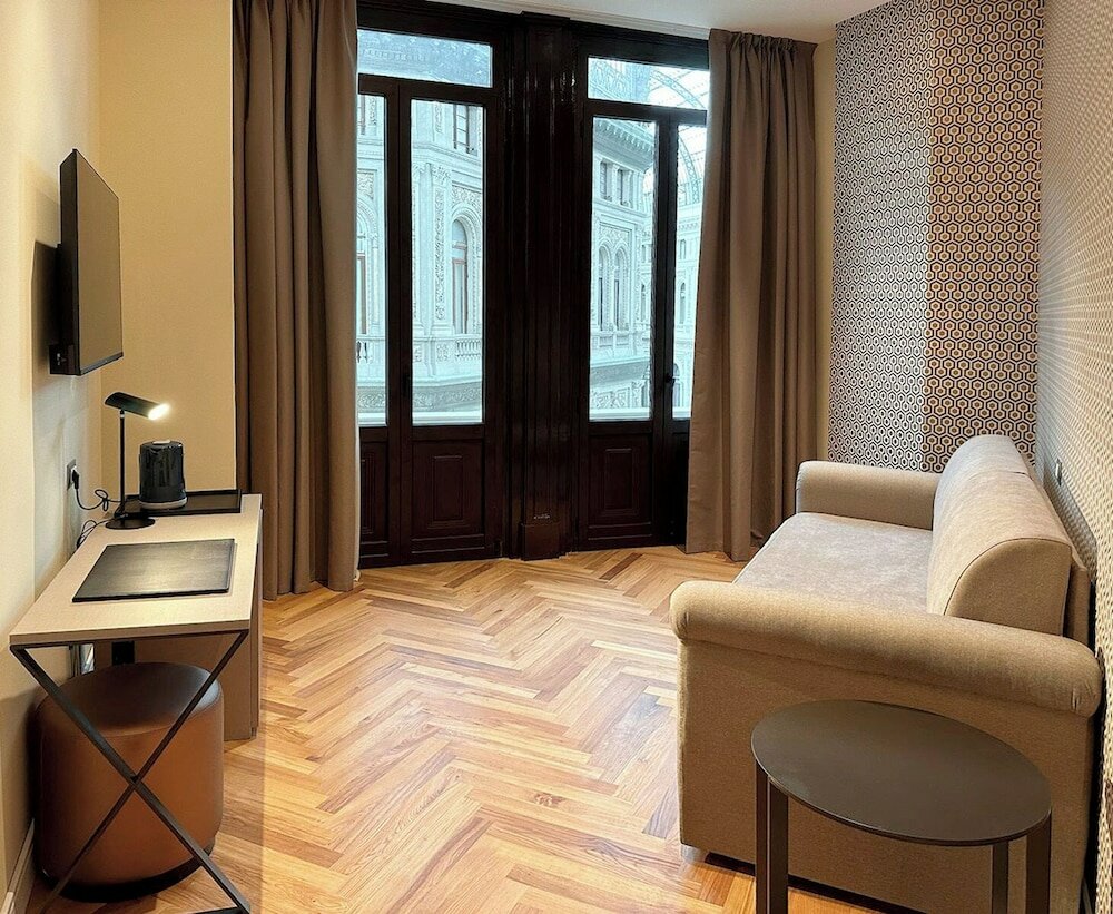 Фото Caruso Place Boutique & Wellness Suites