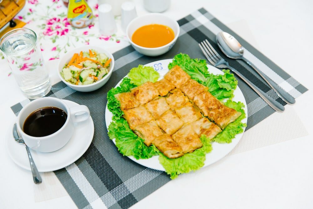 Фото Sinkiat Thani Hotel