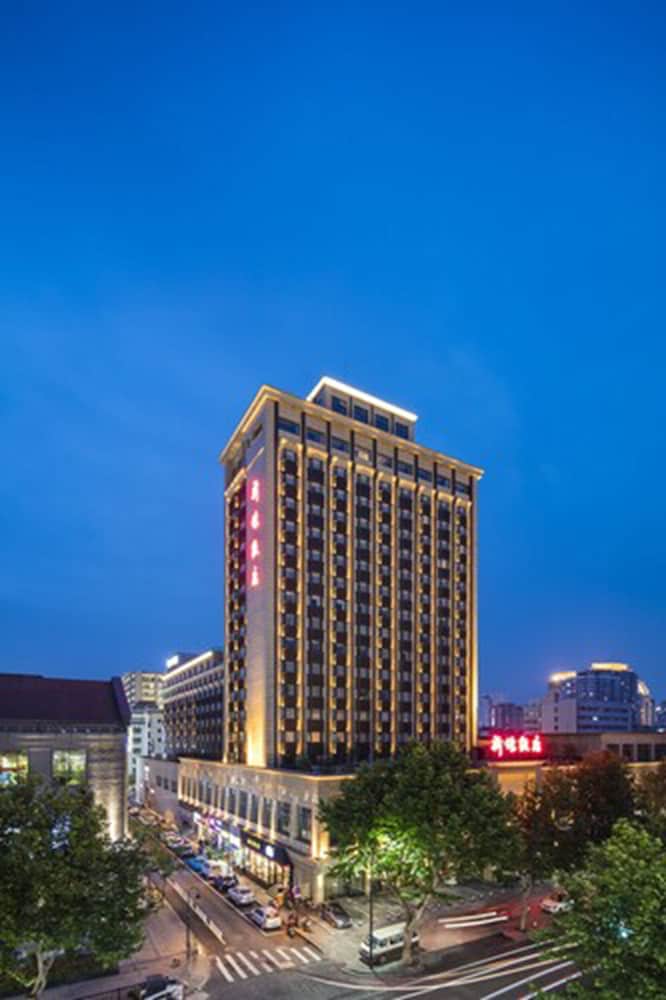 Фото Hangzhou West Lake Xinqiao Hotel