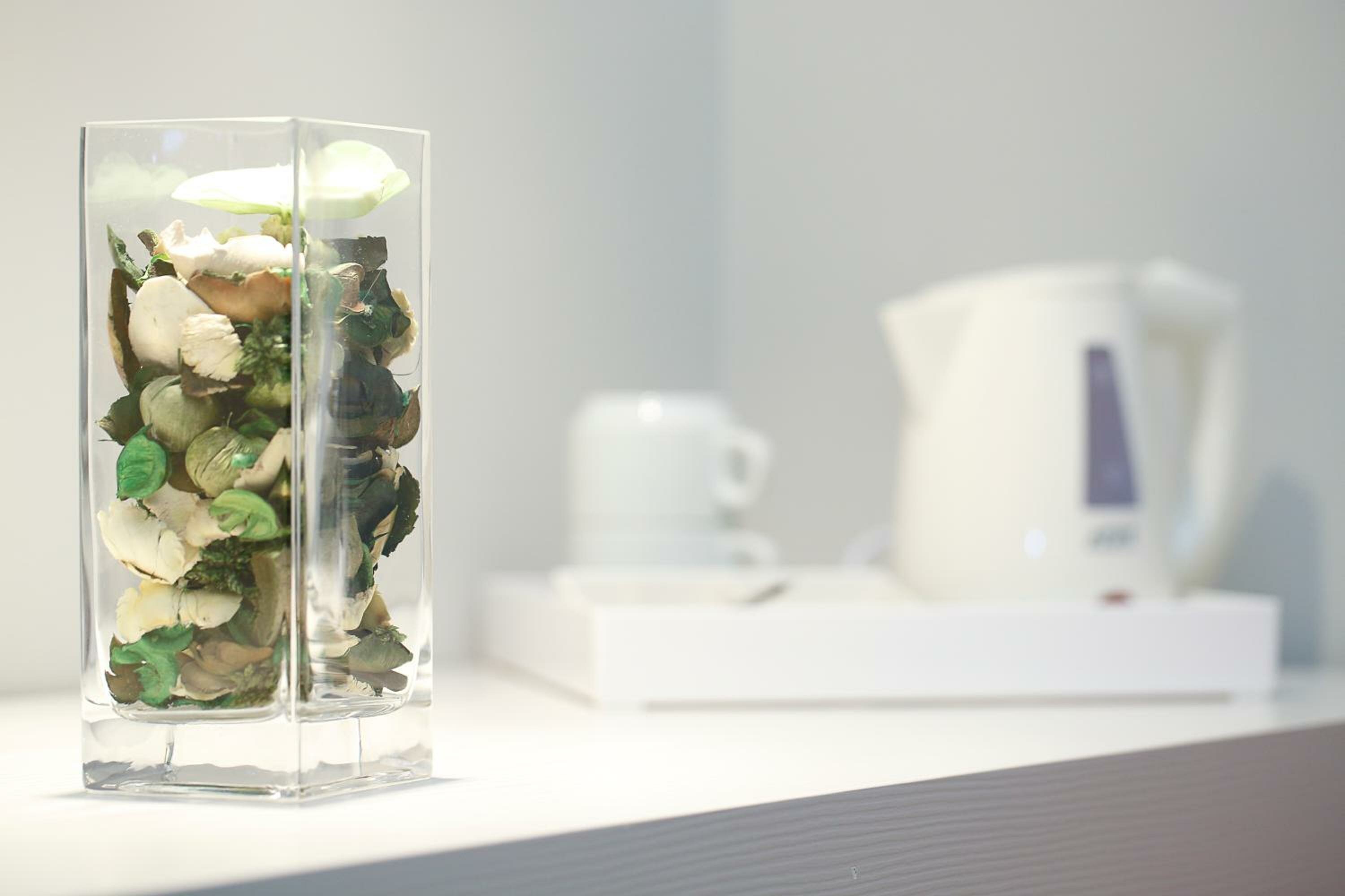 Фото NearHome Smart Suites Guest House