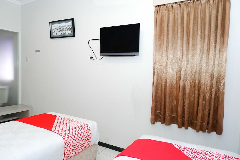 Фото Oyo 389 Sky Guesthouse