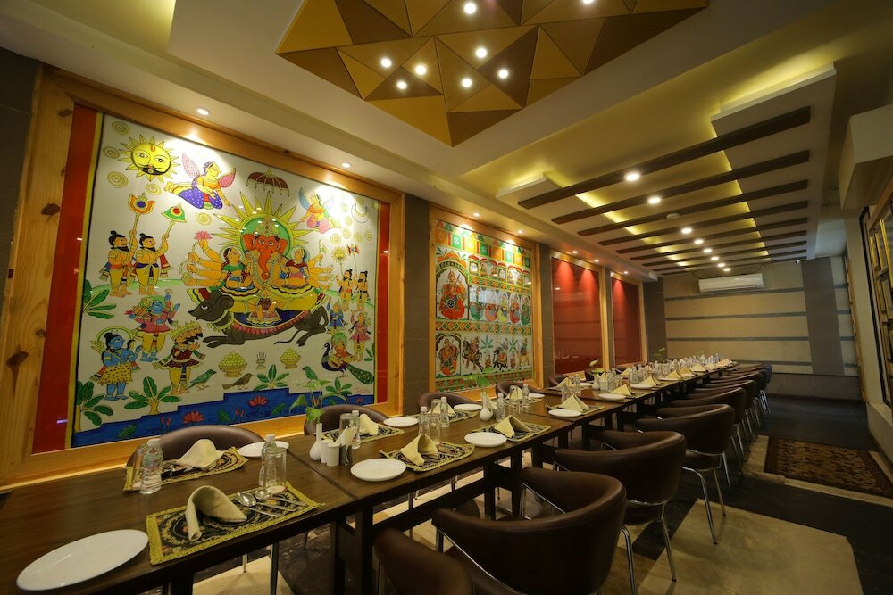 Фото Amantra Comfort Hotel