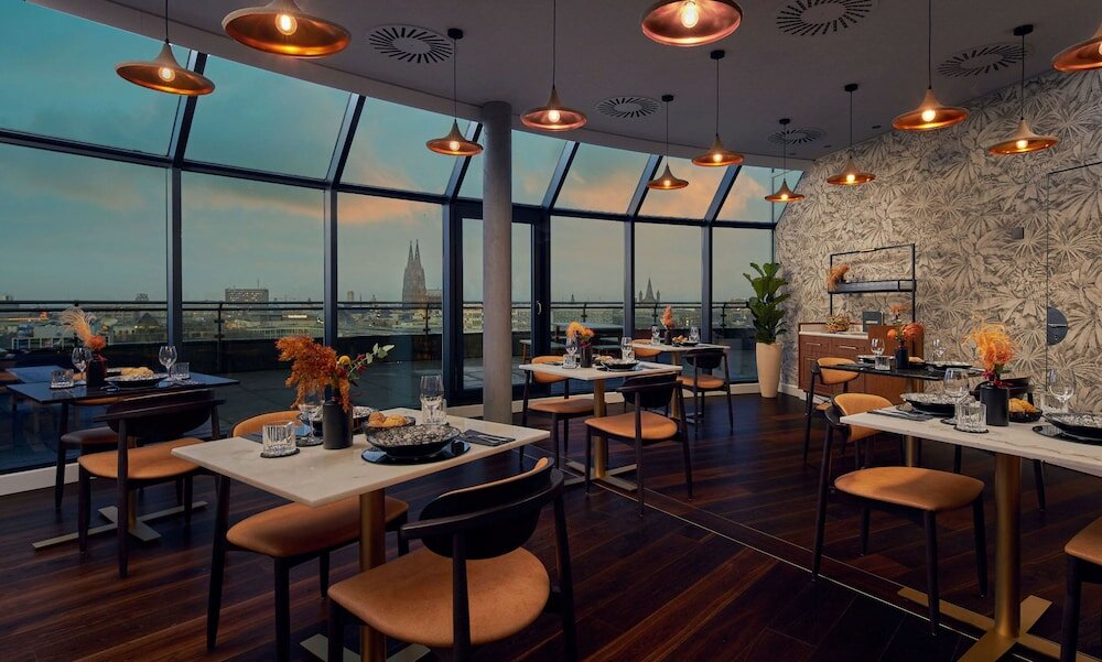 Фото Wasserturm Hotel Cologne, Curio Collection by Hilton