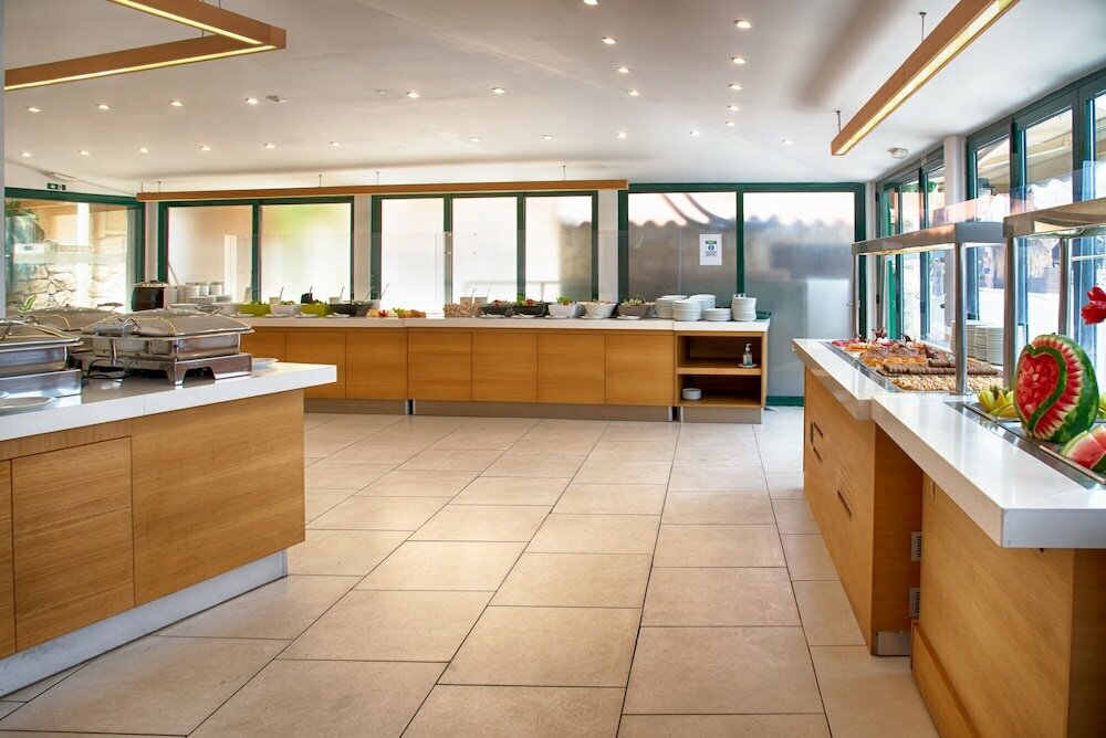 Фото Porto Greco Village Beach Hotel