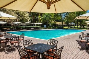 Гостиница Peermont Metcourt Inn at the Grand Palm Gaborone