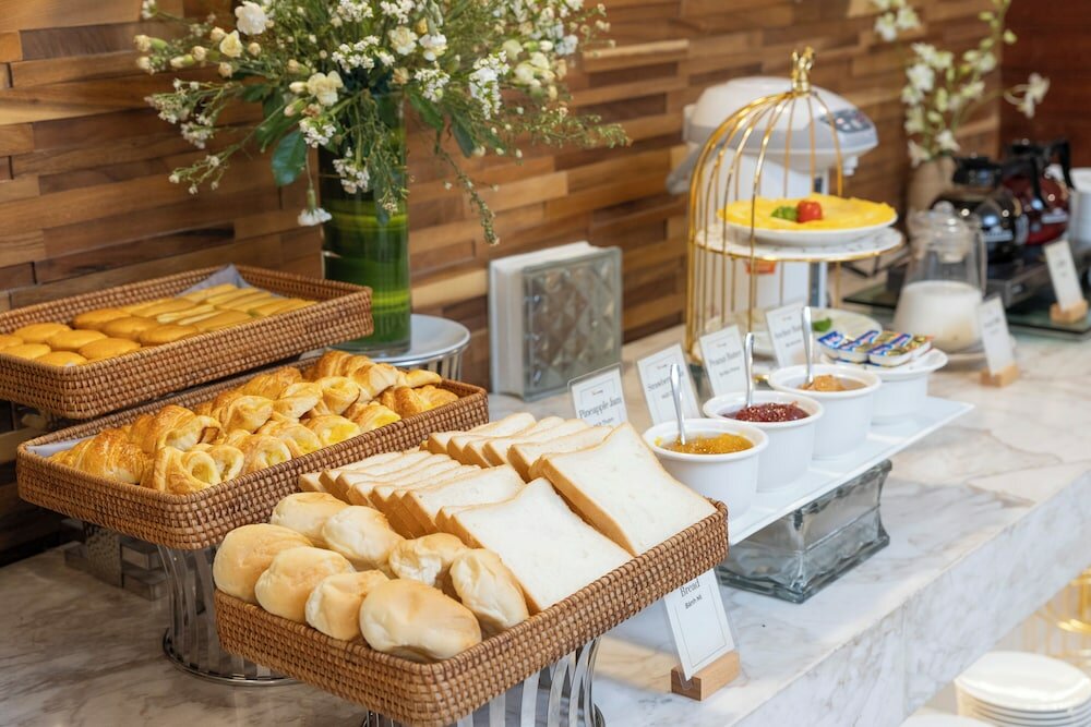 Фото Winsuites Saigon Hotel