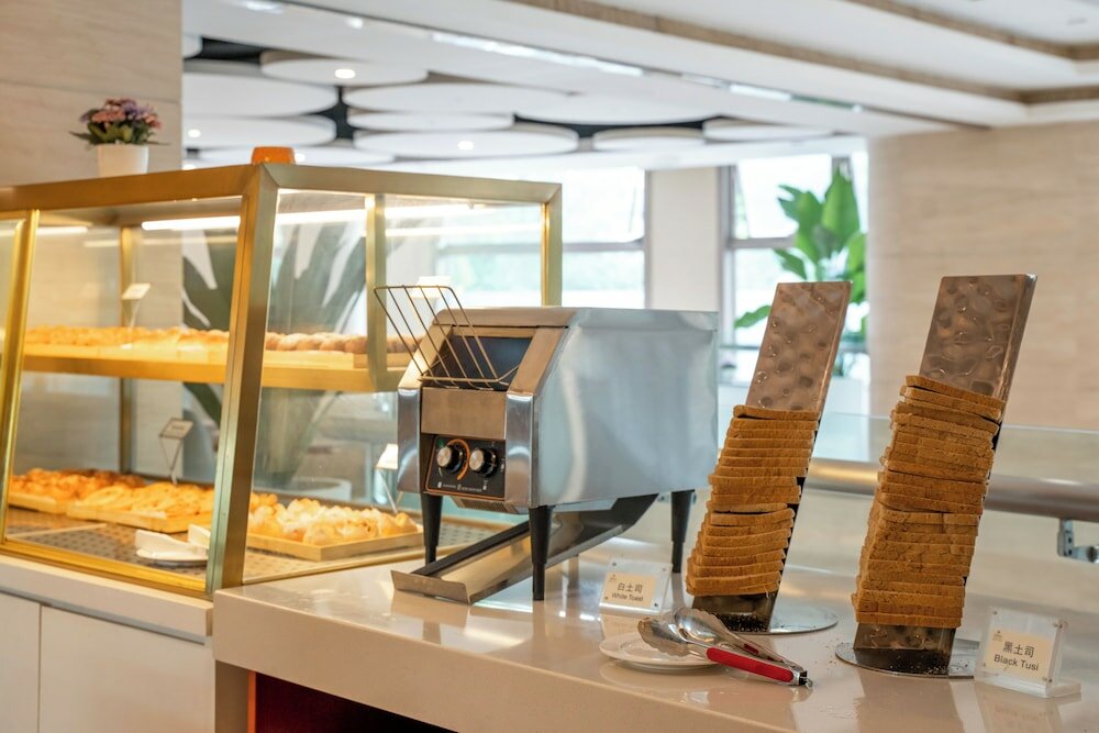 Фото Regal Jinfeng Hotel