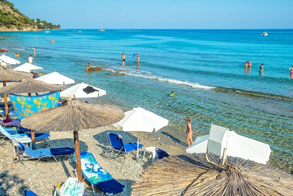 Фото Xenios Dolphin Beach Hotel