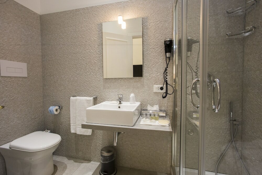 Фото Napoli Class Luxury Rooms & Suites