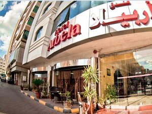 Гостиница Arbella в Шардже