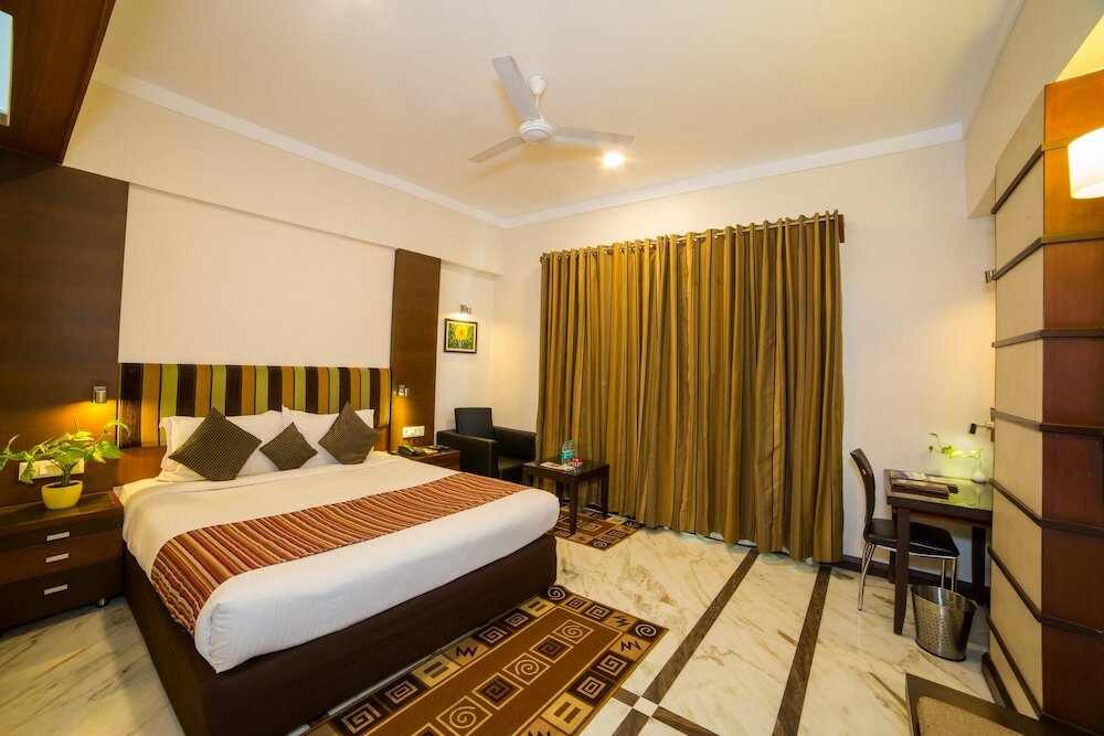 Фото Amantra Comfort Hotel