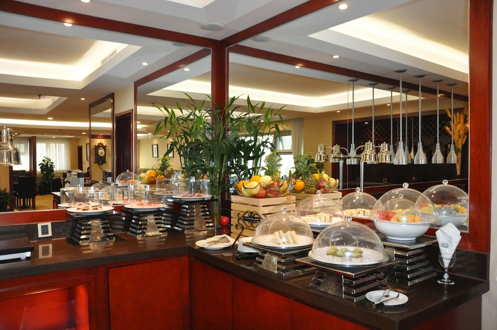 Фото Dalian Kerren Hotel