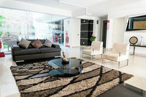 Гостиница Apart Hotel Petit Palace Suites