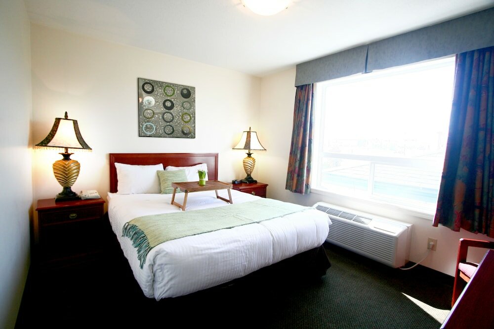 Фото Foxwood Inn & Suites