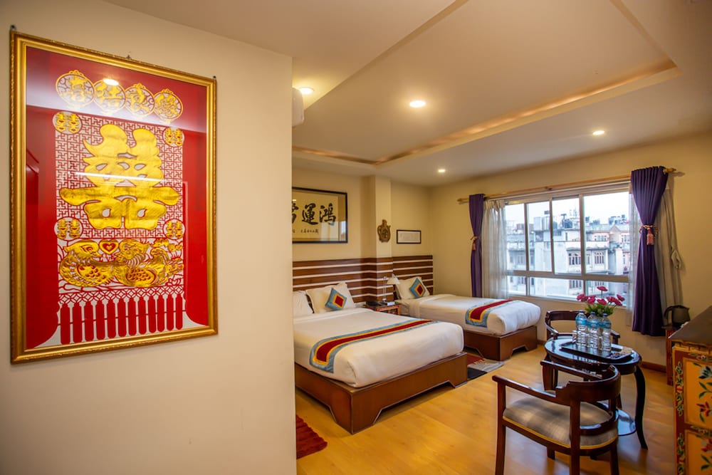 Фото Truly Asia Boutique Hotel