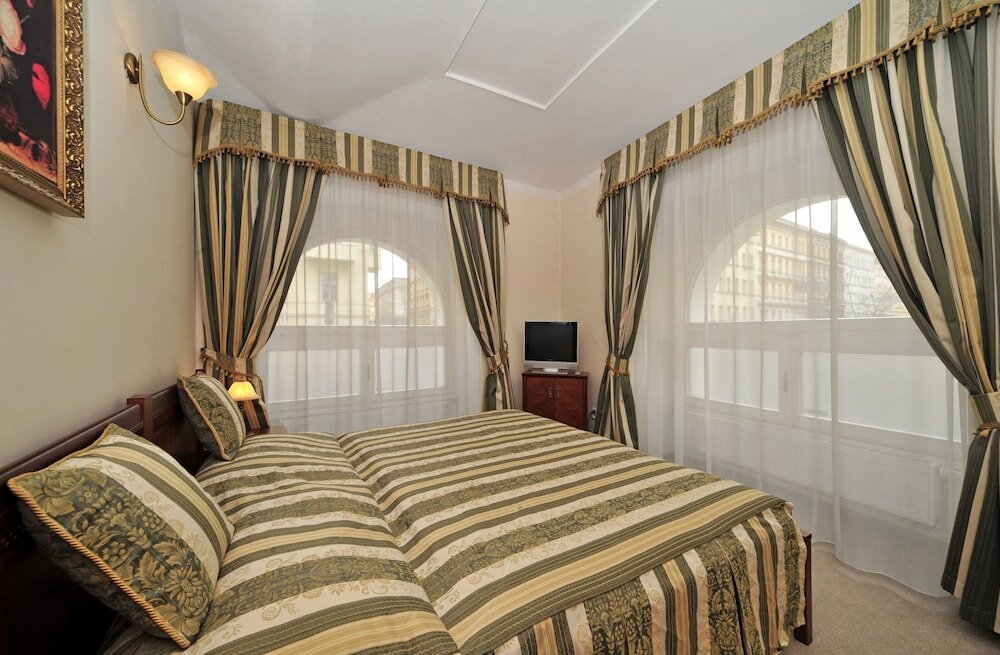 Фото Amigo City Centre Hotel