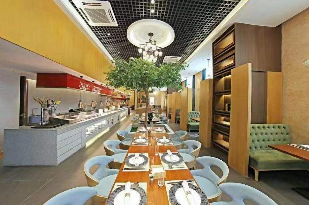 Фото Jiangmen Gladden Hotel