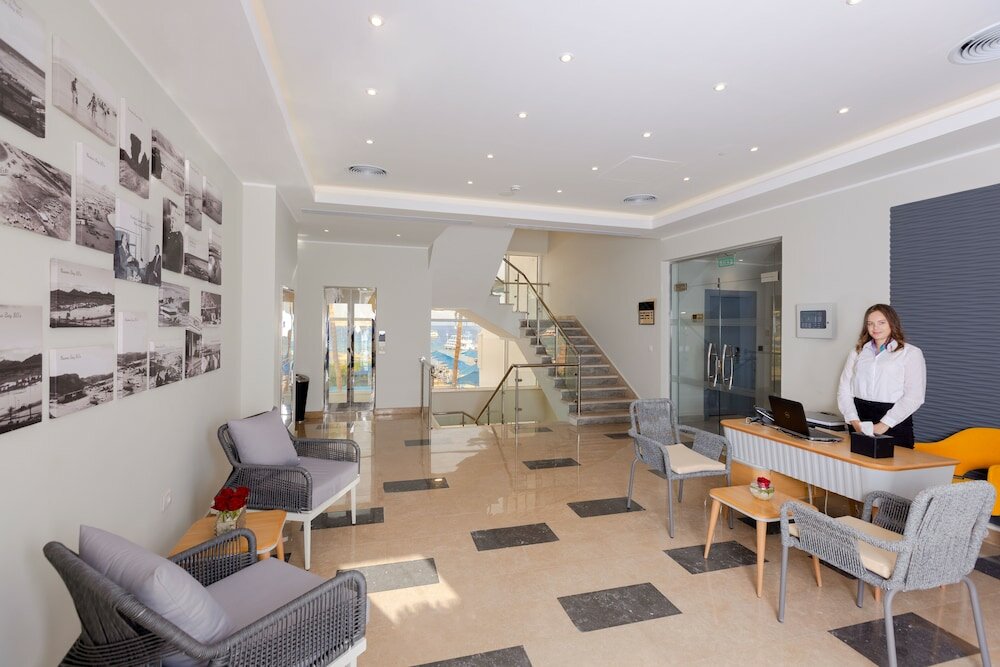 Фото Naama Bay Suites & SPA