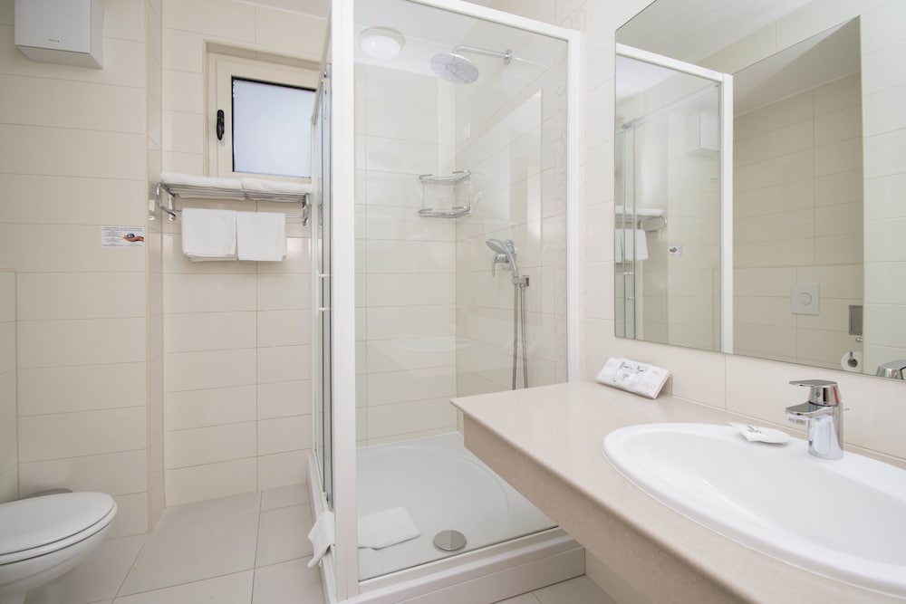 Фото Aparthotel Flora