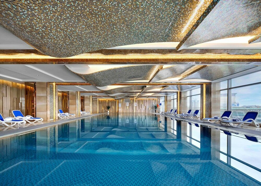 Фото Sanding New Century Grand Hotel Yiwu