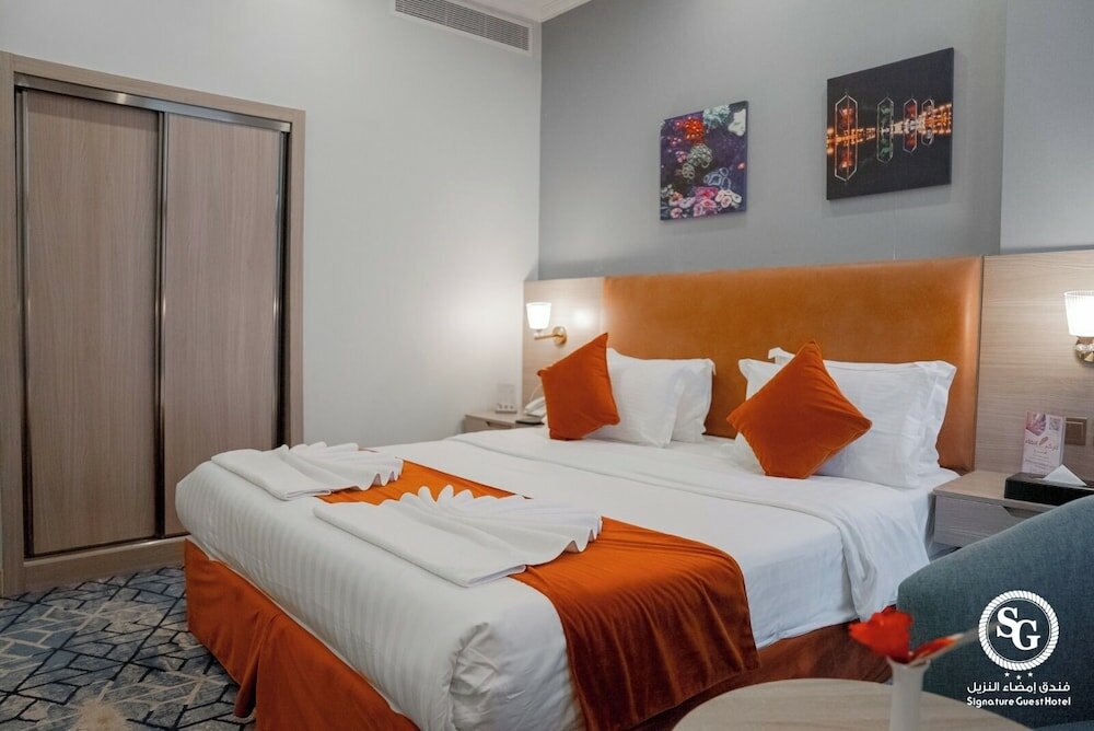 Фото Signature Guest Hotel