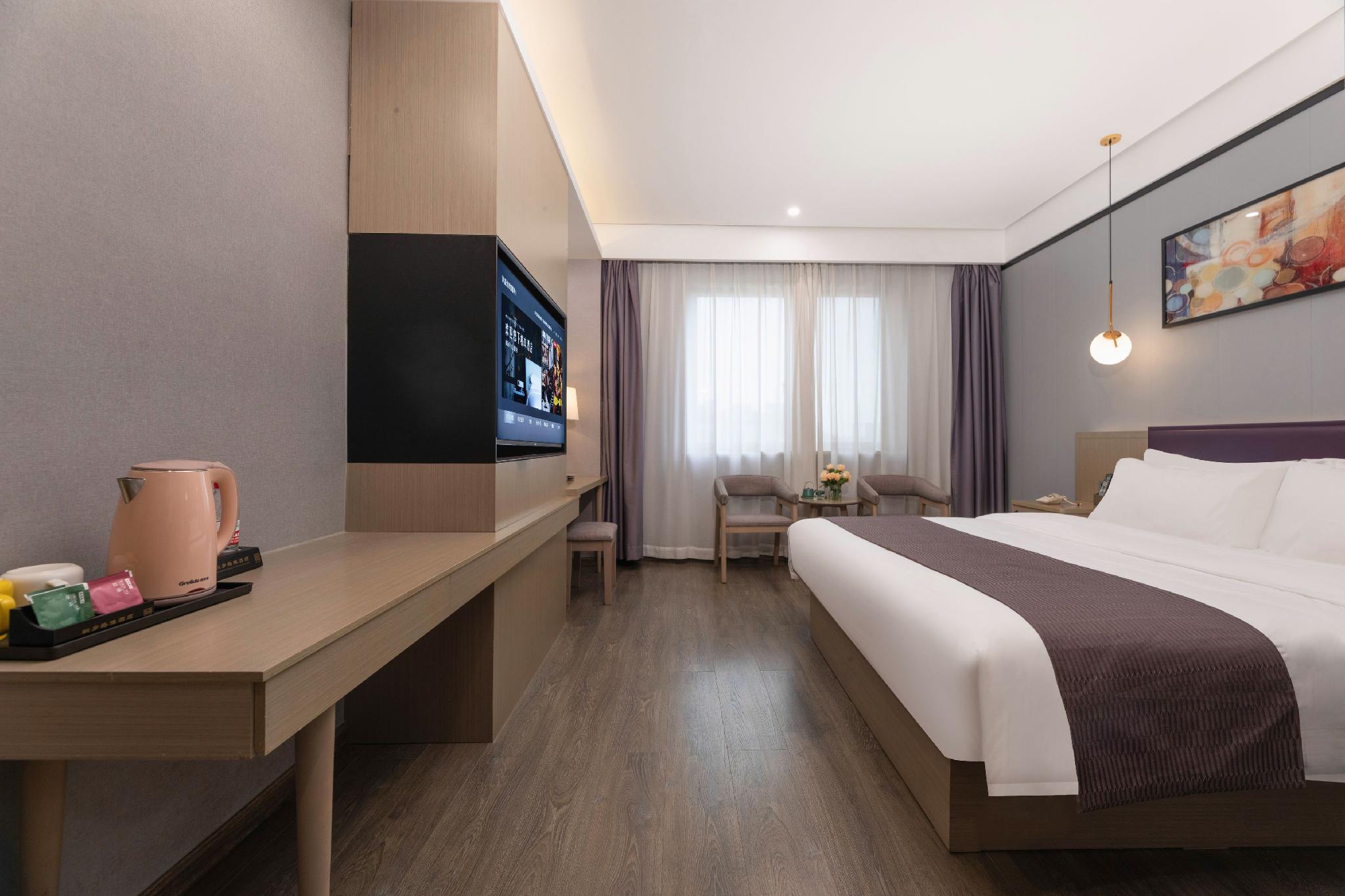 Фото Gya Jiaxing Tongxiang City Century Avenue Hotel