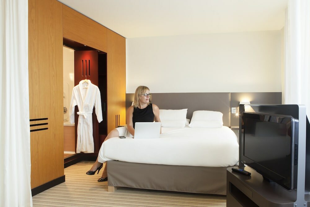 Фото Novotel Suites Paris Nord 18ème Hotel