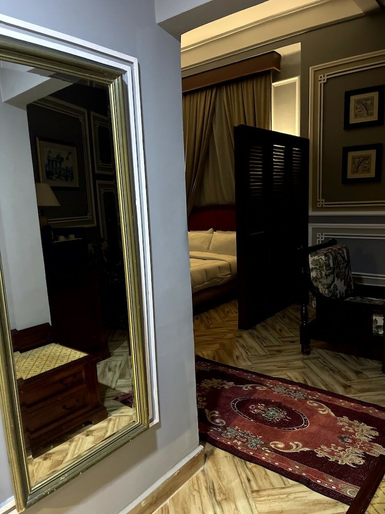 Фото Cosmopolitan Plaza Inn Hotel