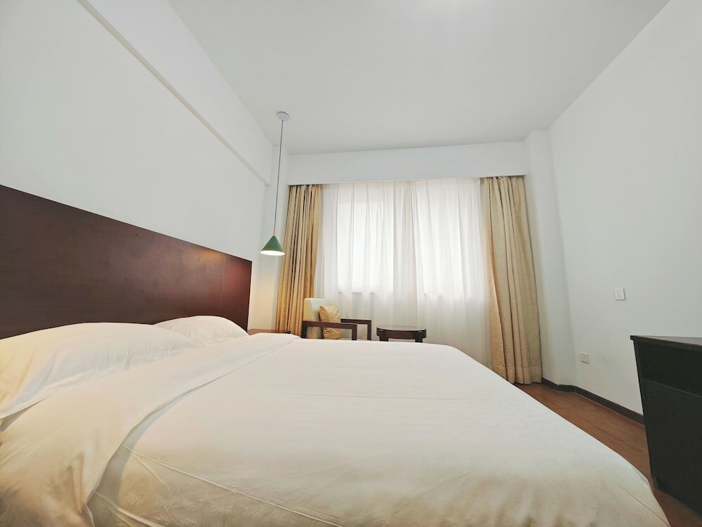 Фото Xinghua Hotel