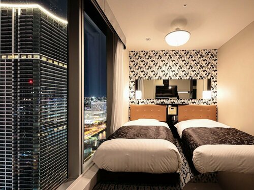 Внешний вид отеля Apa Hotel ＆ Resort Yokohama Bay Tower в Йокогаме, фото 4