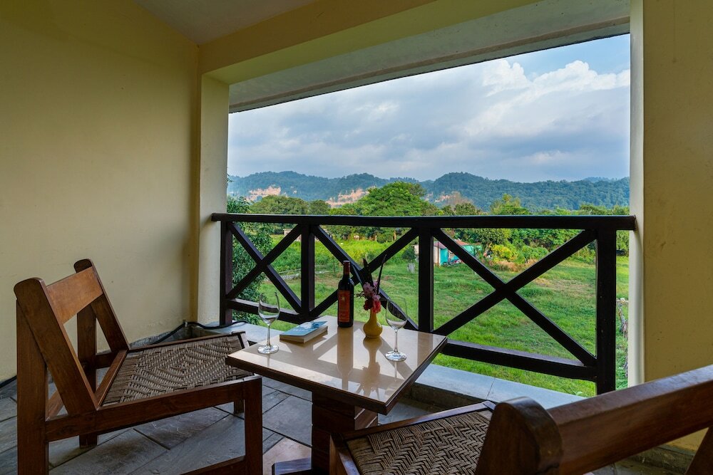 Фото Corbett Wild Resort - A River Access Property