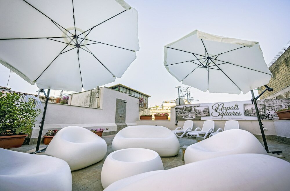 Фото Napoli Squares Suites