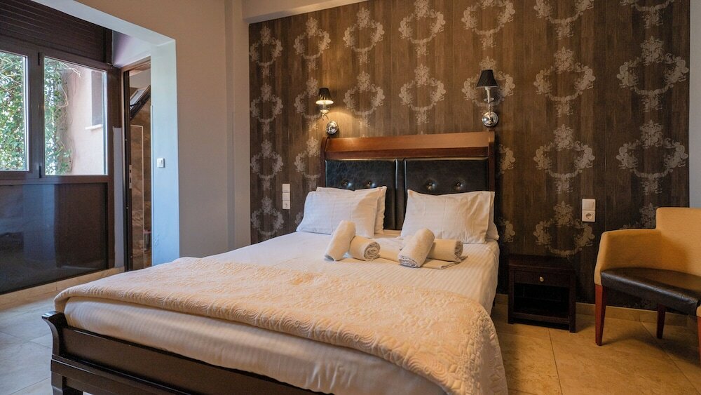 Фото Toti Boutique Rooms
