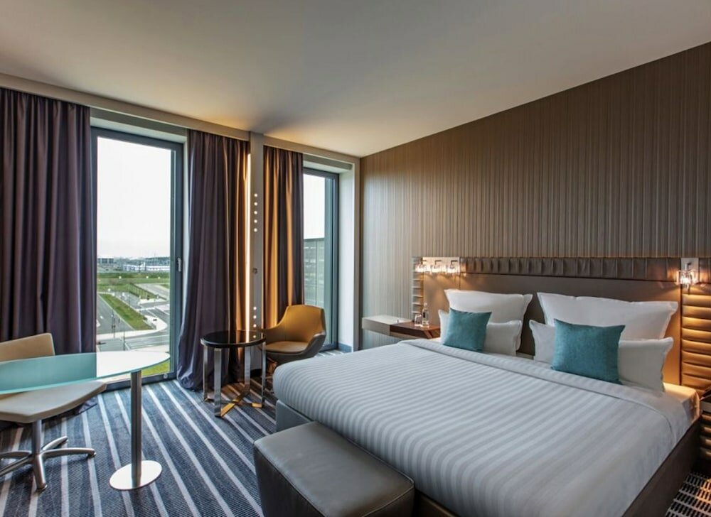 Фото Steigenberger Airport Hotel Berlin