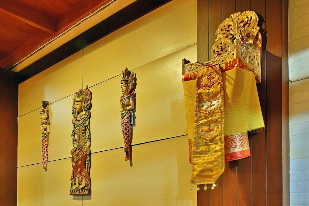 Фото Puri Naga Beachfront Cottages