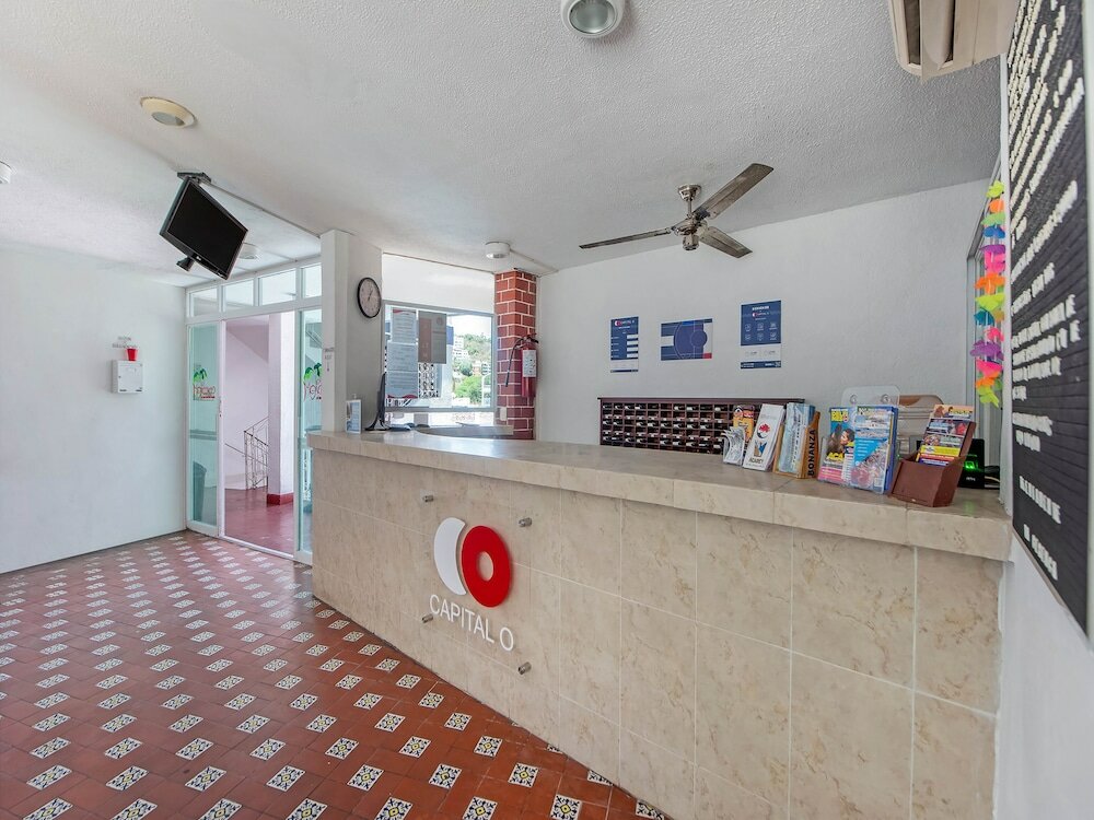 Фото Capital O Hotel El Mejicano