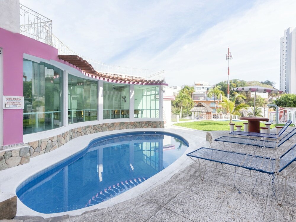 Фото Capital O Hotel El Mejicano