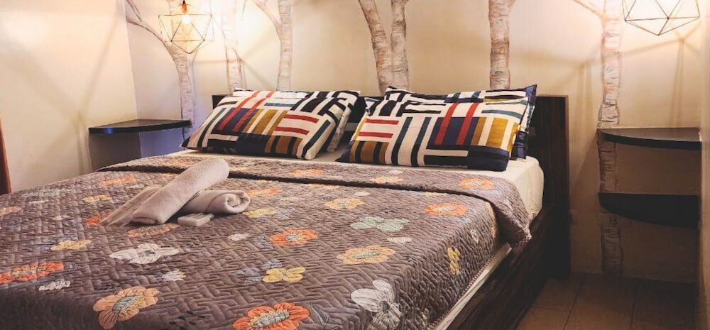 Фото Tess and Tessha Condotel near T3 Airport