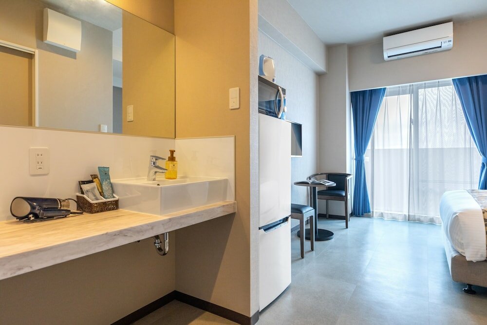 Фото Mr. Kinjo in Grand Blue Chatan