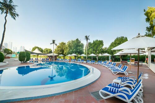 Гостиница Hotel Holiday International в Шардже