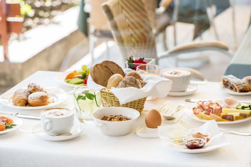 Фото Alpine City Wellness Hotel Dominik