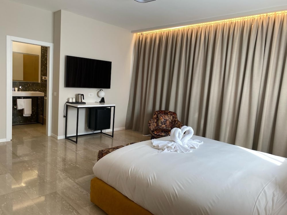 Фото Oasi Village Hotel