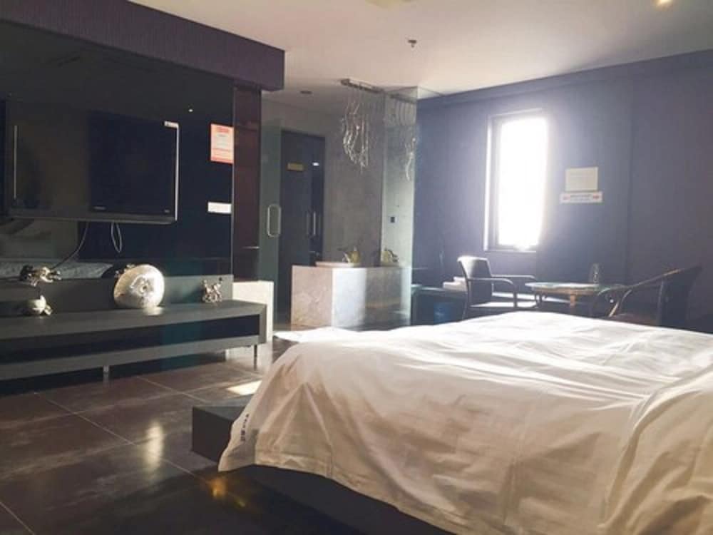 Фото Qingdao Hengbo Hotel