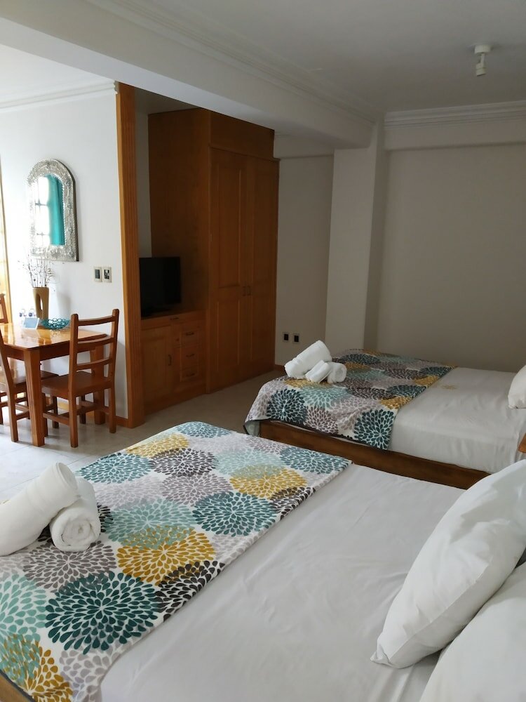 Фото Suites Sevilla